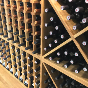 oak wine wall bottle holes