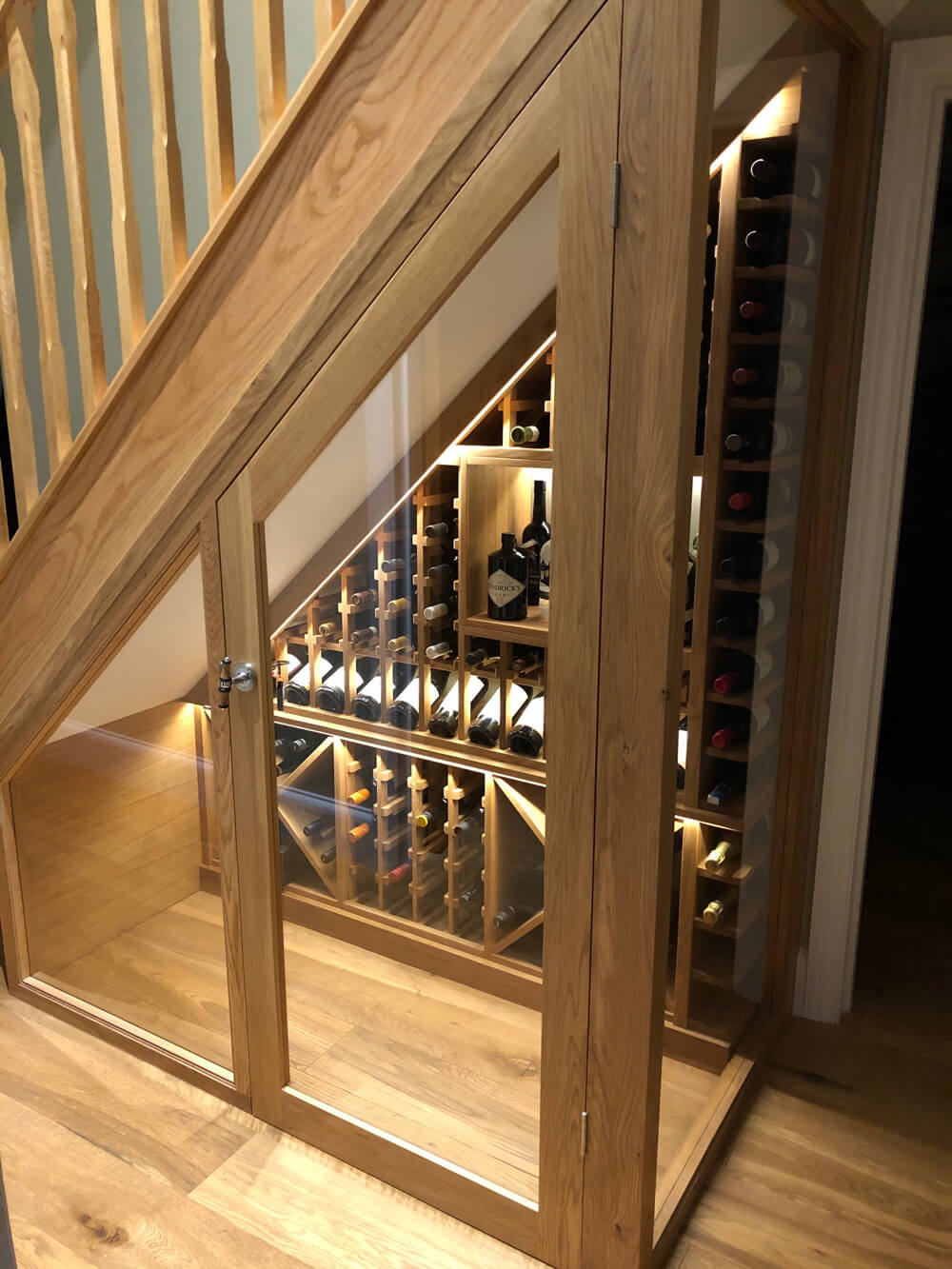 Oak wine rack understairs